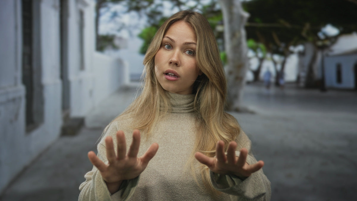 woman with hands up for a modified fighting stance