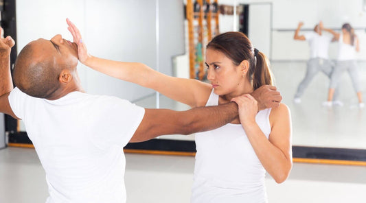 woman throwing a palm heel strike