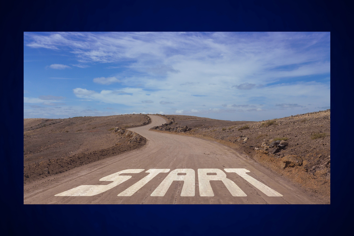 A dirt road with the word "Start" at the entrance