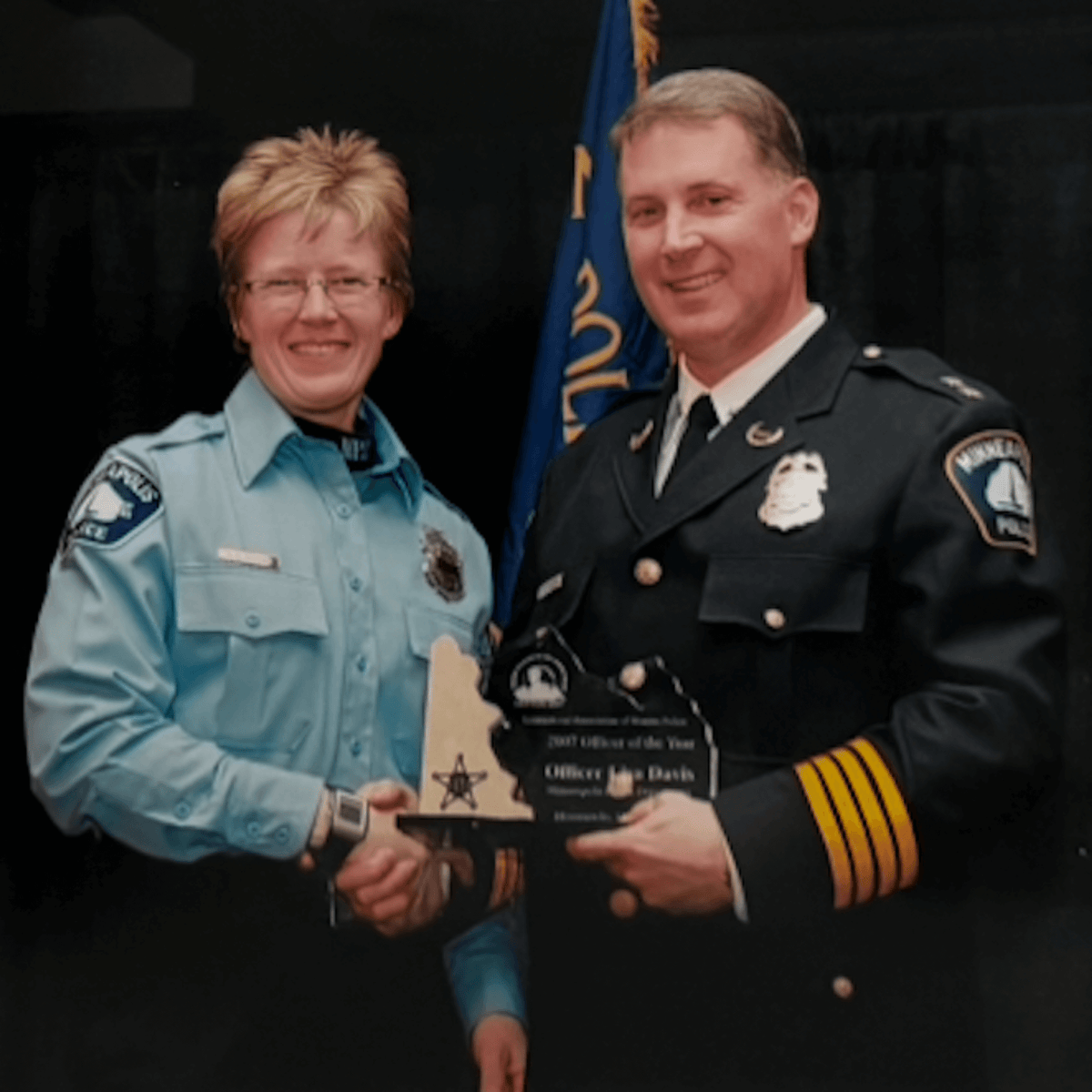 Lisa Davis receiving a police award in 2007