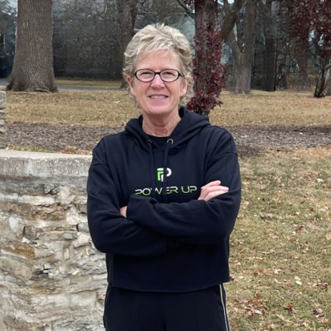 Self-defense expert Lisa Davis wearing a Power Up sweatshirt