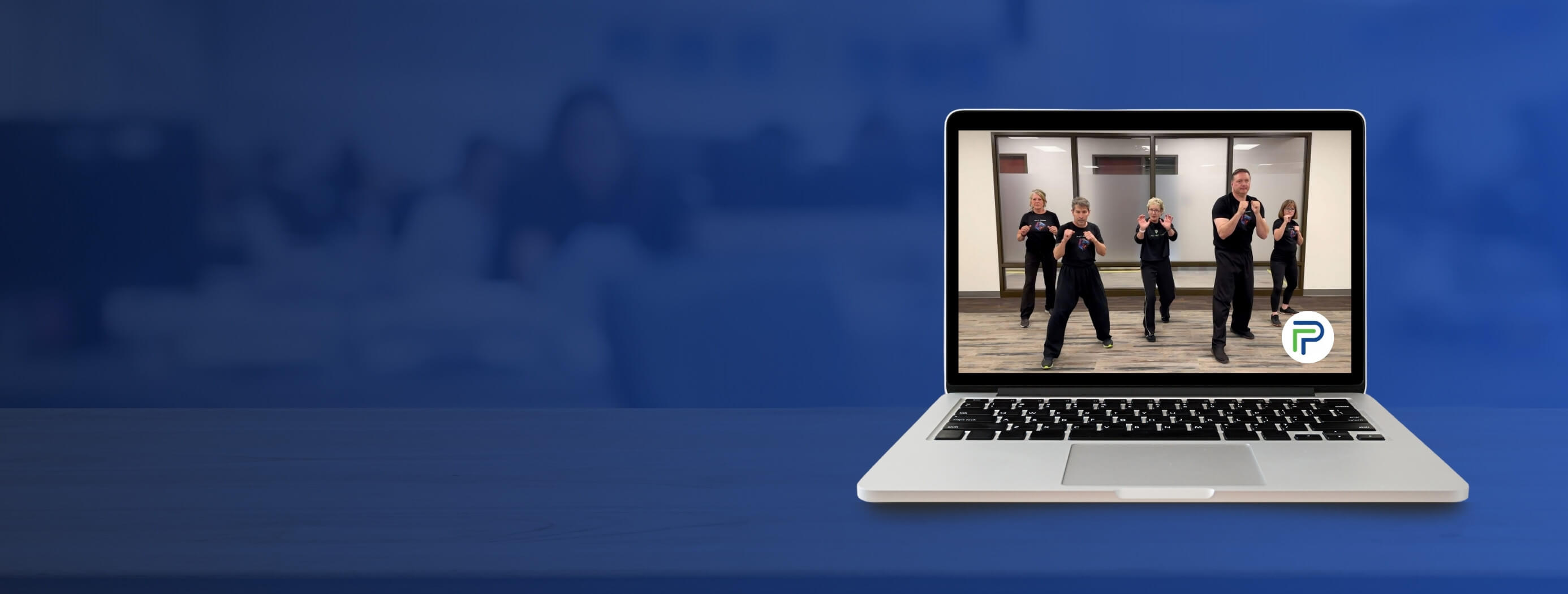 Laptop displaying a self-defense online course