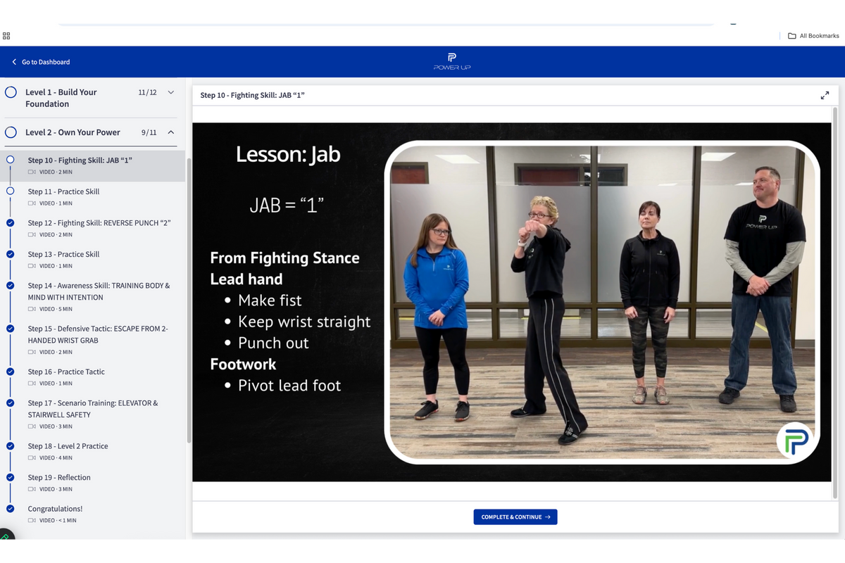 Screen capture of a self-defense training software interface with instructional video.